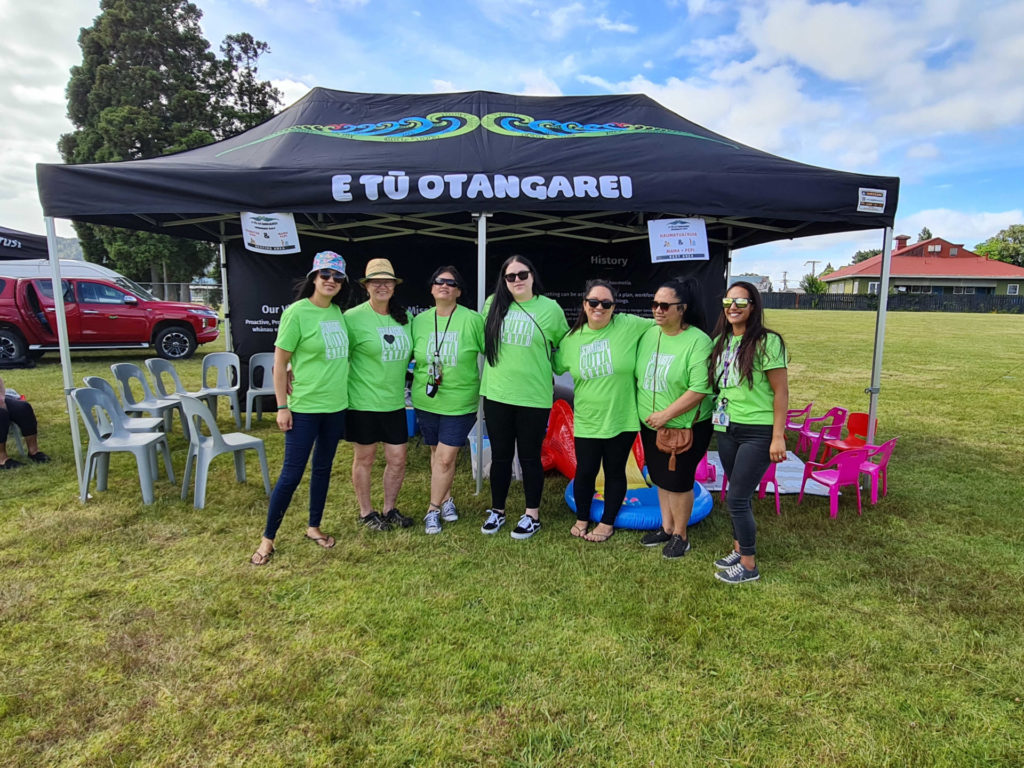 Kaimahi from Te Hau Āwhiowhio ō Otangarei Trust at a recent E Tū Otangarei event 