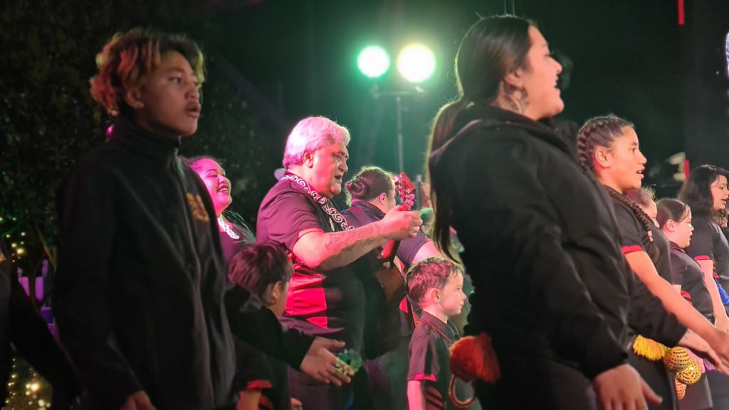 Whānau perform at a Te Reo Irirangi o Te Upoko o Te Ika event