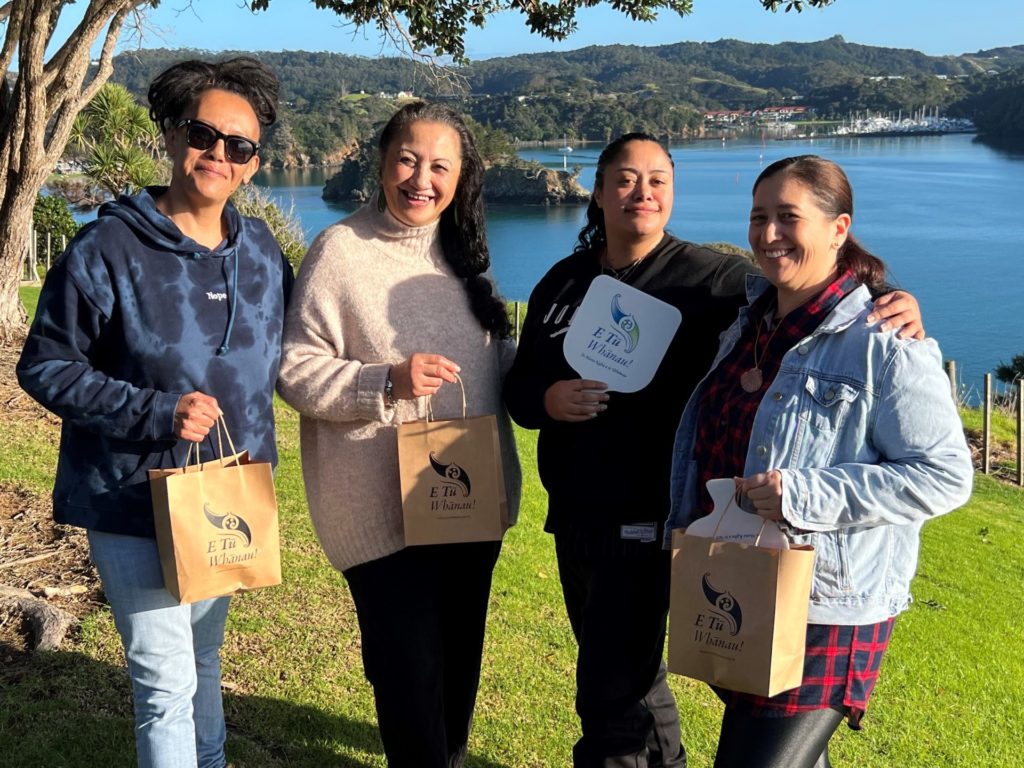 Four wāhine enjoy time together at a whānaqu wānanga