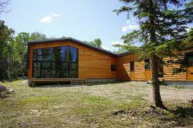 Picture of The Grey Buffalo Grandfather Wellness Centre, inspired by a Māori marae and in which Ma Mawi whānau fly a Tino Rangatiratanga flag 