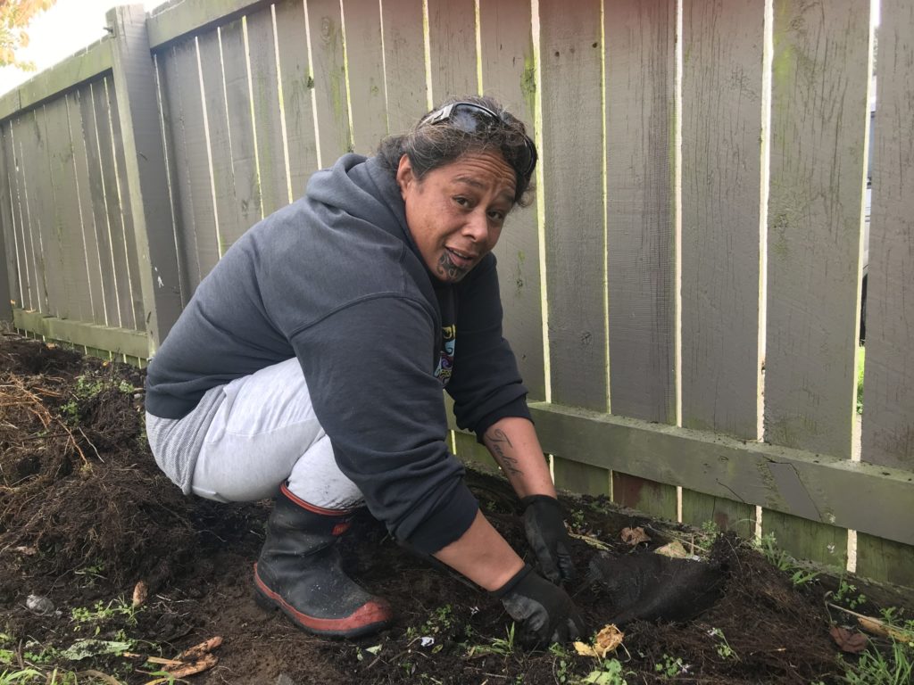 BJ in the garden where mahi māra gave her connection to the friends she has lost, and some peace