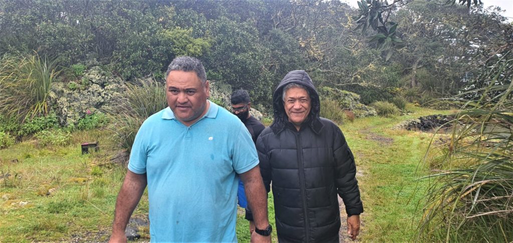 Mikaira and Rima walk with a participant on Rangitoto Island 