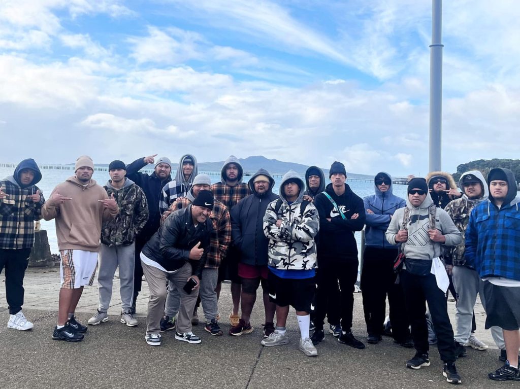 A group of young tāne at start of weekend on Rangitoto Island with ETW Kaimahi, Mikaira Pau.