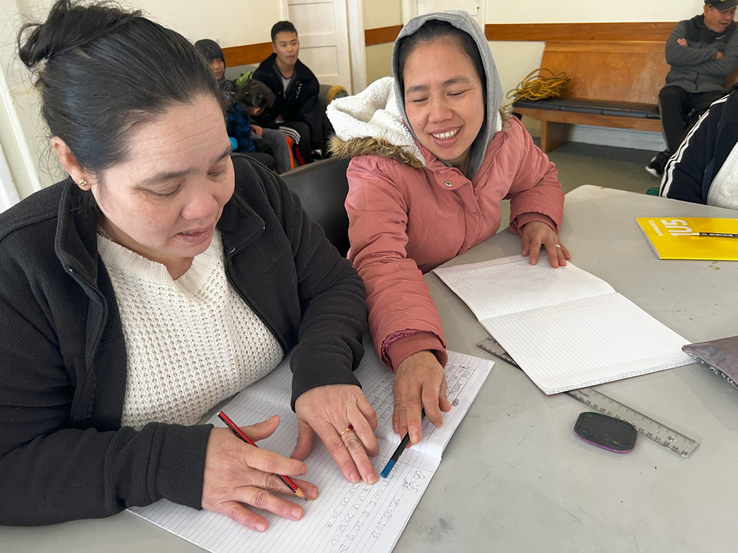 People of various ages attend the Karen language classes 