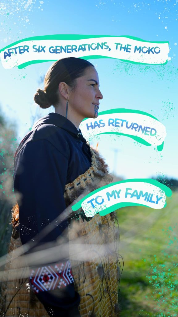 In this picture from Mana Wāhine Hauora  social media, a woman is viewed from the side. She wearsa korowai and moko kauae. Around her, text says, "After six generations, the moko has returened to my family."