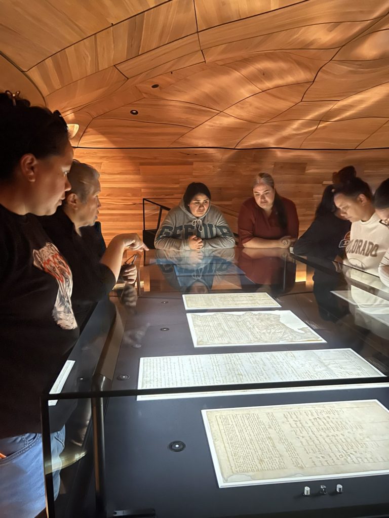 Pōmare wāhine carrying out research at Wellington's National Library