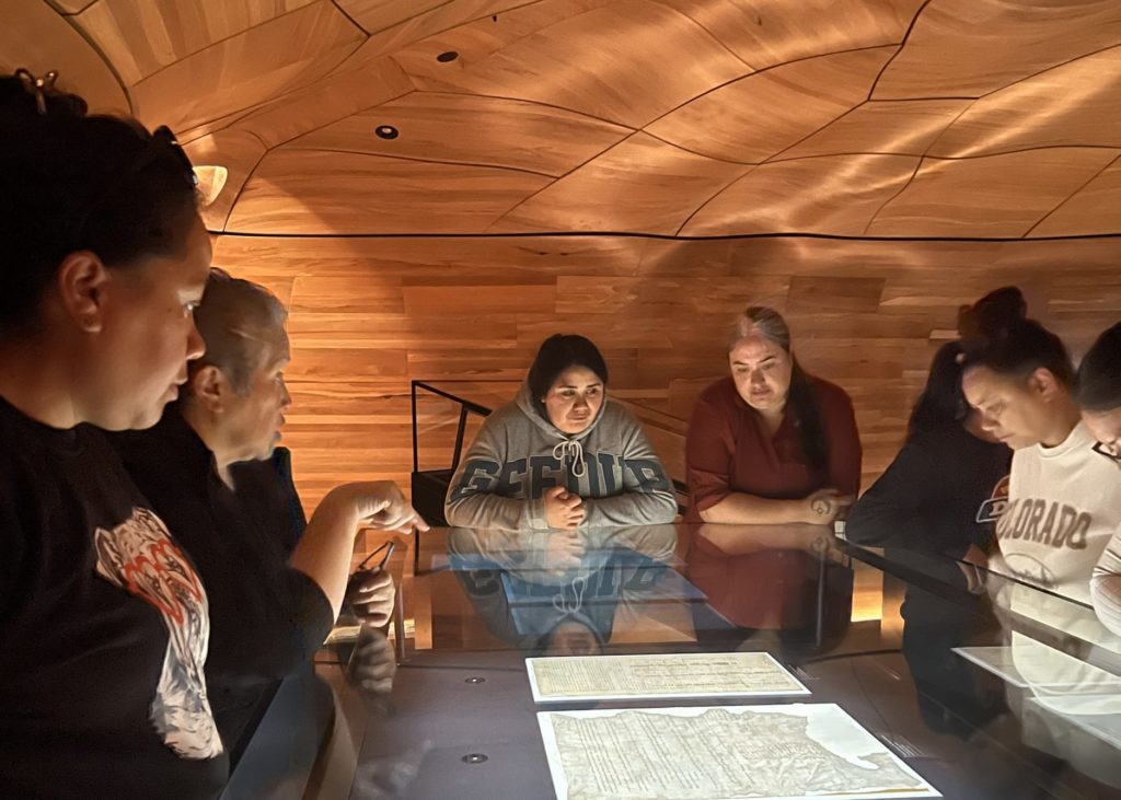 Pōmare wāhine carrying out research at Wellington's National Library